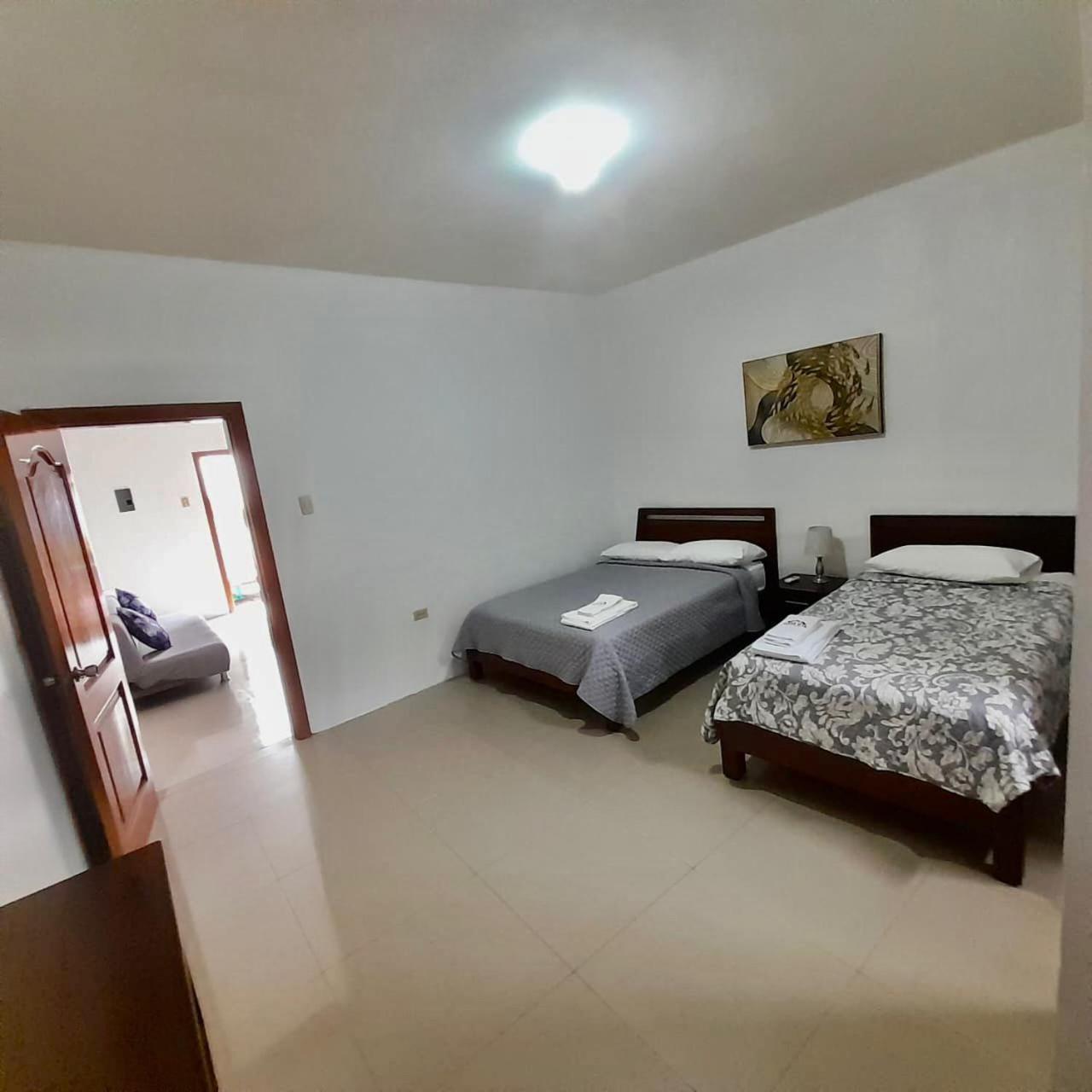 Apartahotel Casa Soleil Puerto Villamil Habitación foto